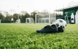 Football training pitch in Belgium representing Shin Yamada's loan move to OH Leuven from Celtic