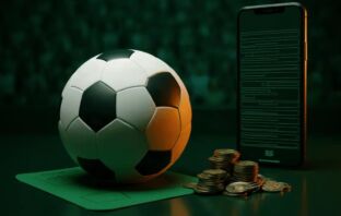 Football and betting slip on green surface with stadium bokeh — best international betting sites for UK players 2026