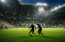 Celtic Park under floodlights ahead of a tense Champions League play-off match