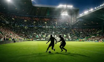 Celtic Park under floodlights ahead of a tense Champions League play-off match