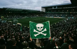 Celtic supporters display a green banner at Celtic Park while backing the team and protesting the board
