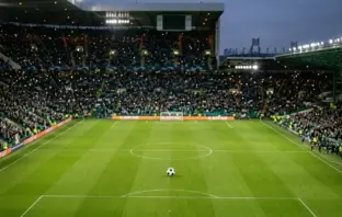 Celtic Park under floodlights representing Celtic’s Champions League play-off against LASK