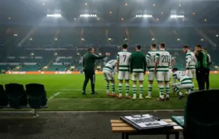 Celtic-inspired team regrouping in a stadium after European disappointment, reflecting transfer needs and Europa League recovery