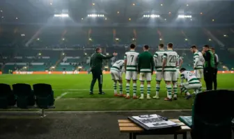 Celtic-inspired team regrouping in a stadium after European disappointment, reflecting transfer needs and Europa League recovery