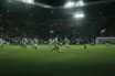 Celtic-inspired team showing disciplined control during a tense floodlit football match