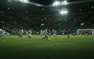 Celtic-inspired team showing disciplined control during a tense floodlit football match
