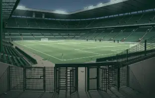 Empty floodlit football stadium illustrating Scottish Cup sanctions after crowd disorder