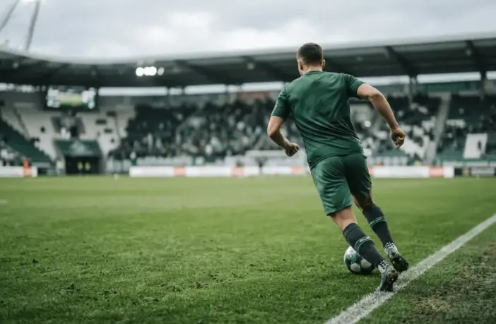 Unidentified winger attacking down the right flank during football training