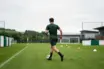 Young football defender training at a professional academy ground as Celtic seek left-back cover