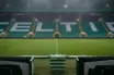 Empty Celtic Park tunnel with a green football shirt suggesting Reo Hatate’s uncertain Celtic future