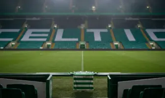 Empty Celtic Park tunnel with a green football shirt suggesting Reo Hatate’s uncertain Celtic future