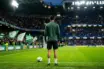 Young forward preparing for a Celtic loan move under stadium floodlights