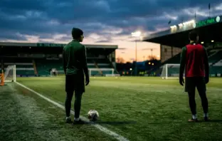 Anonymous footballers on a training pitch representing Celtic’s Luke Chambers loan decision