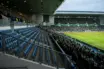 Empty away-support section at a Scottish football derby stadium as travelling fans are barred from fixtures