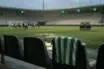 Empty football stadium bench with a green-and-white shirt after a defeat