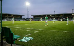 Empty left side of a football defensive line symbolising Celtic's injury crisis before St Mirren