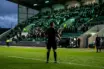 Anonymous match officials prepare on the pitch at McDiarmid Park before Celtic’s rearranged fixture in Perth.